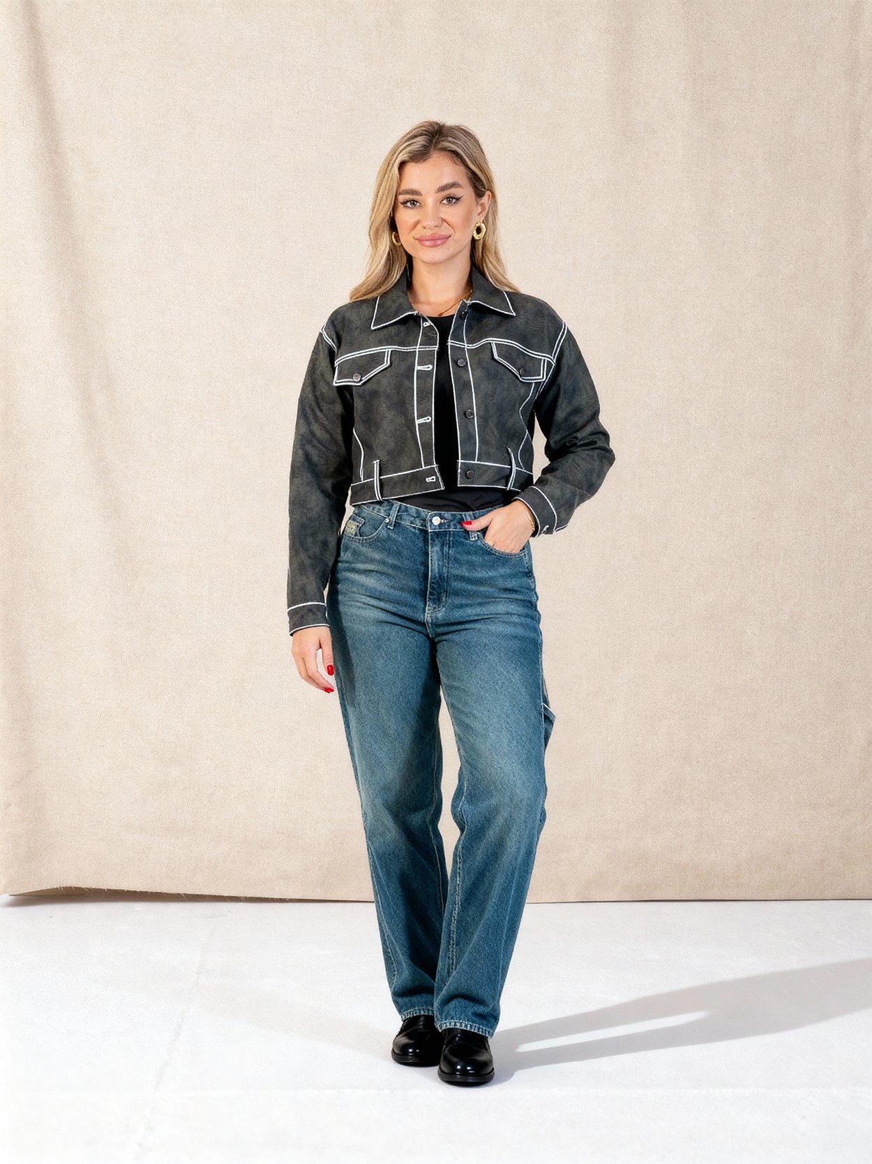 Leather jacket with a front button closure